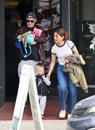 Los Angeles, CA - *EXCLUSIVE* - Family came out over Dakota's new haircut, but their new baby had to be 'alone at home